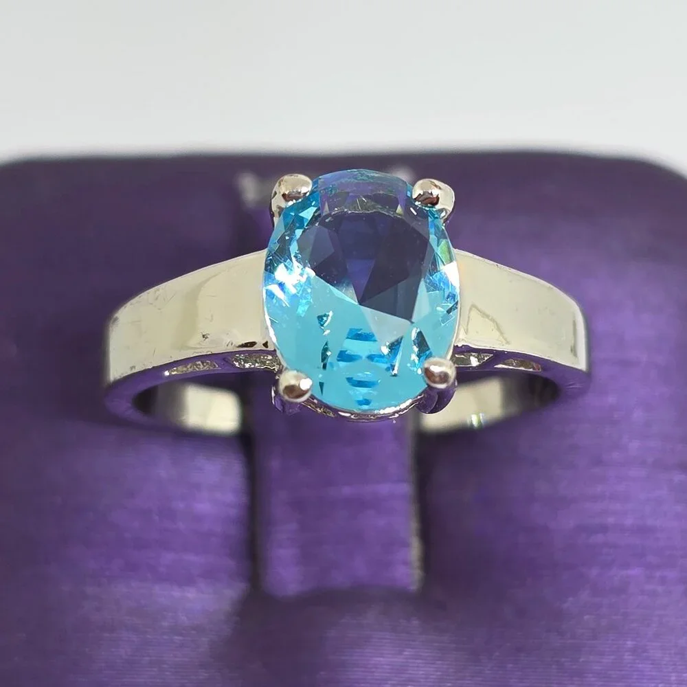 Beautiful Silver Oval Faceted Light Blue Rhodium Plated Solitaire Ring Sz 6.75